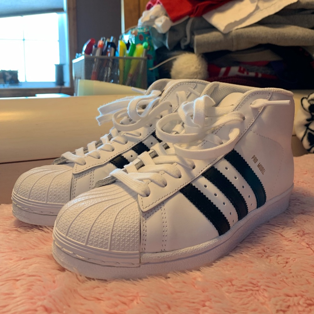 White high top adidas sneakers